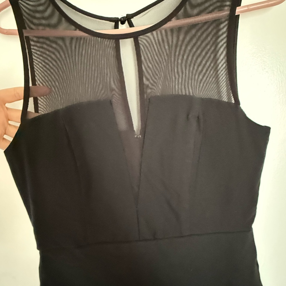 Elegant Black Sleeveless Dress with Sheer Panel